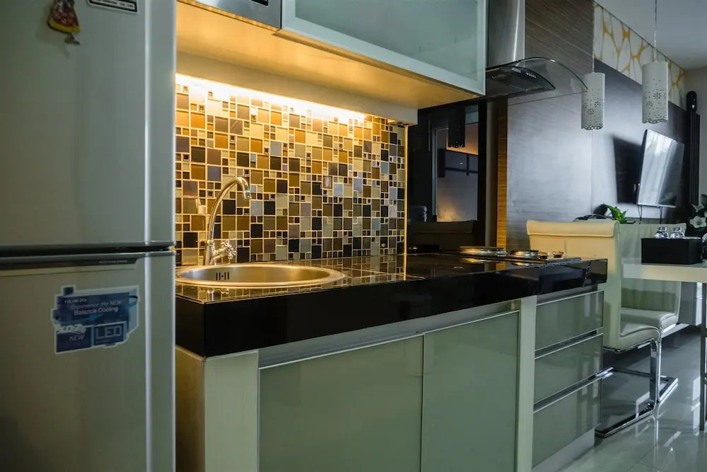 Luxurious 1BR At Dago Suites Apartment