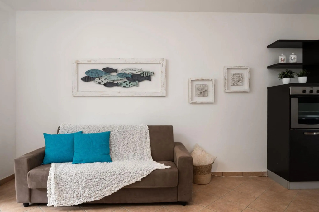 The apartment is located on two floors. The ground floor has a living room with sofa bed, with kitch-TRILO MIRTO