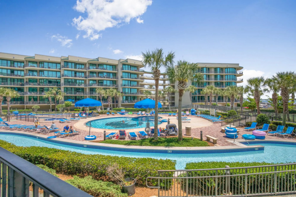 Condo on bay with boat launch and multiple pools