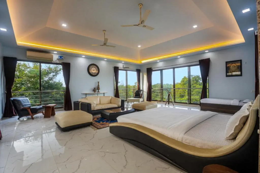 SaffronStays Aura, 4 BR Luxury Pool Villa with Game Room & Lawn