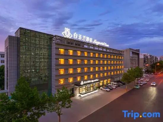 Magnolia Business Hotel ( Dalian Jinzhou Hengda Garden）
