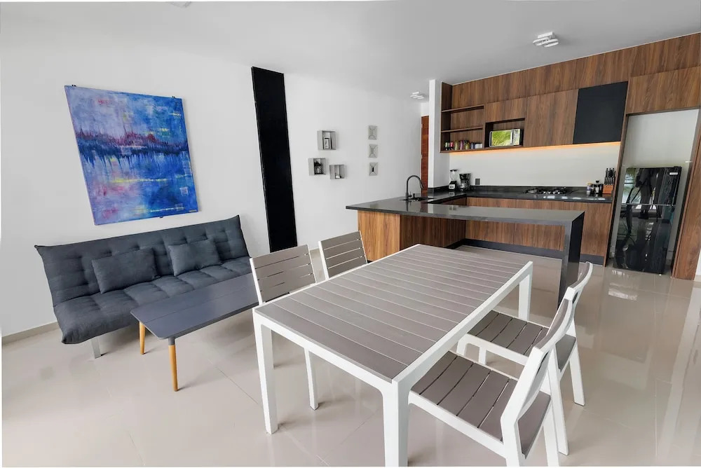 Angelina 28 Beachfront and Family Apartments - Modern and Relaxing Long Stays (20 min from Cancun Airport)