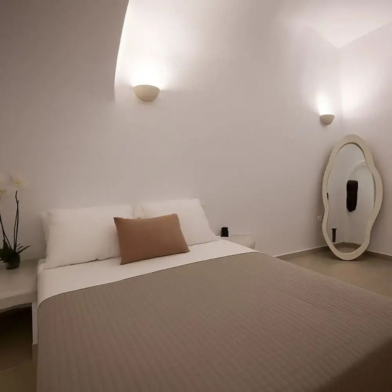 Three Domes Oia - an Iconic Collection