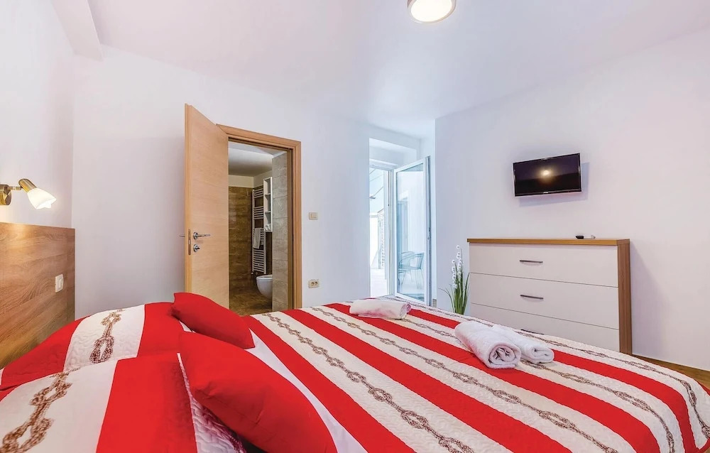 Awesome Home in Novi Vinodolski with WiFi, 4 Bedrooms, Hot Tub