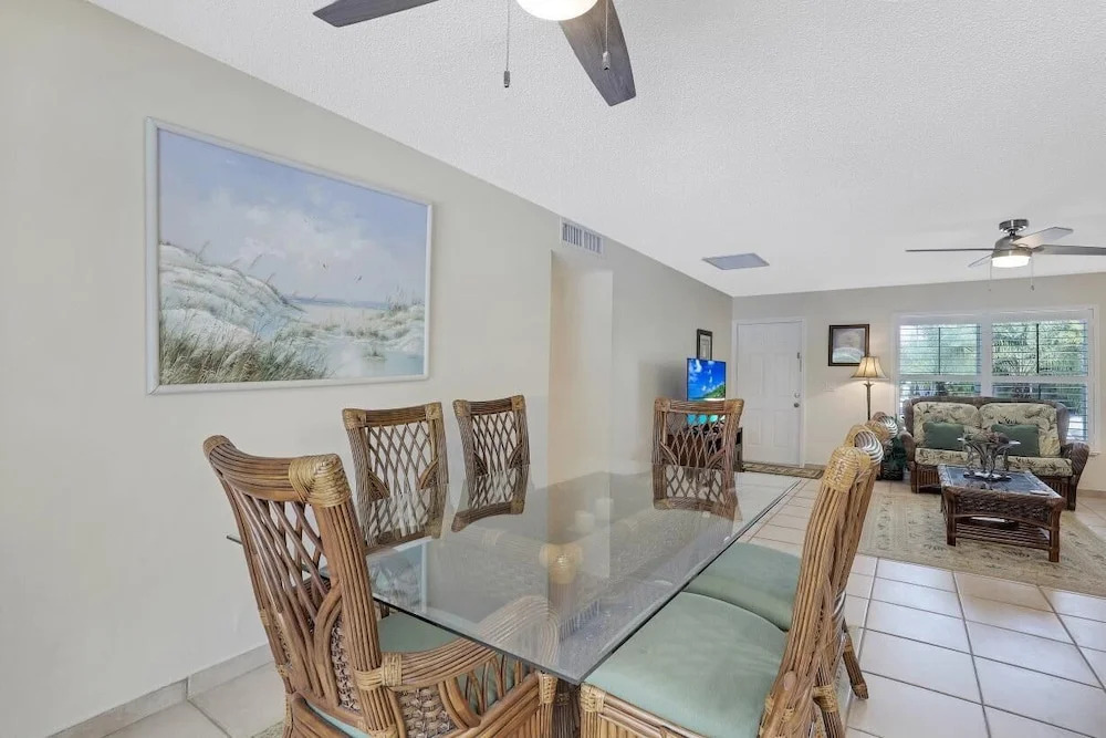 Cozy Home With Sunroom, Pool and Steps to Beach