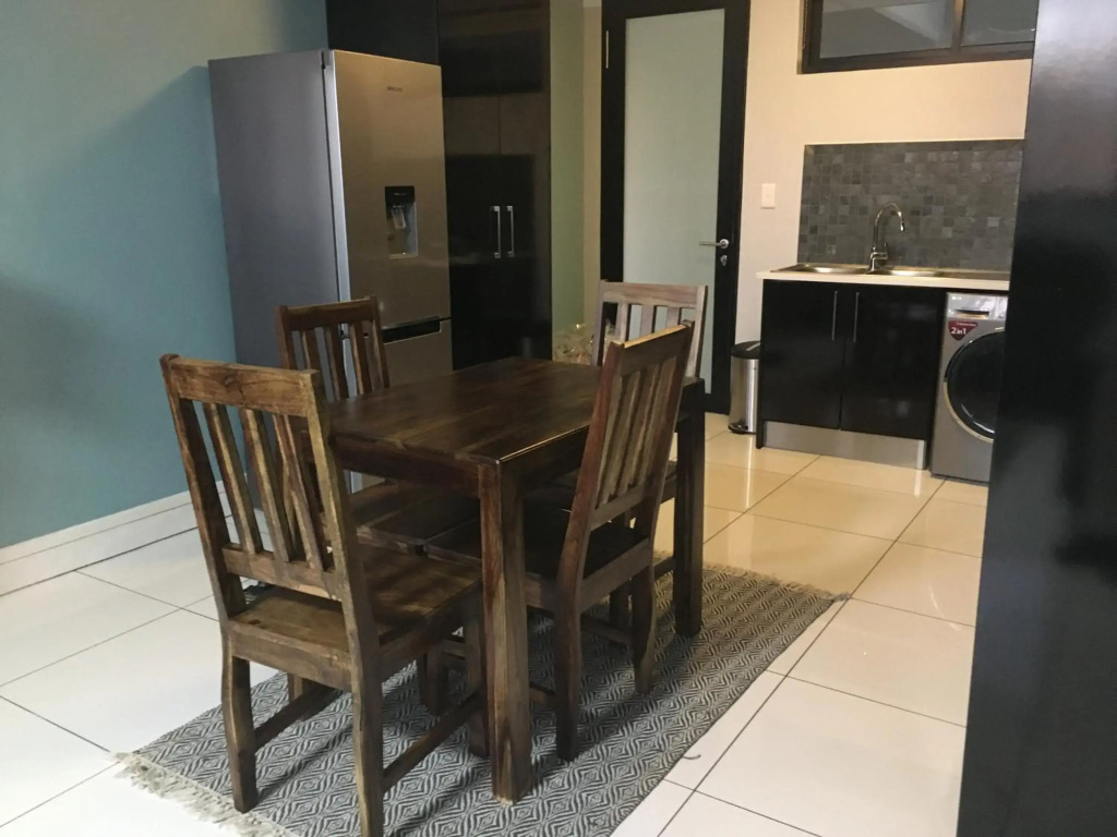 Highrise Windhoek apartment with skyline view, pool and gym