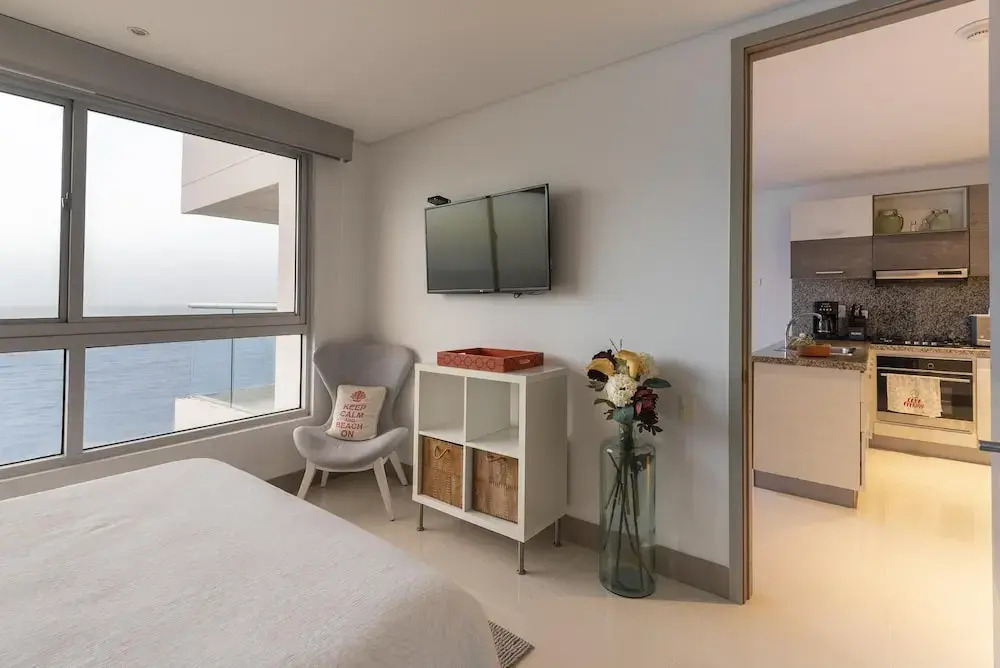 Relaxing 1 BR Beachfront Apartment w Wifi and Pool