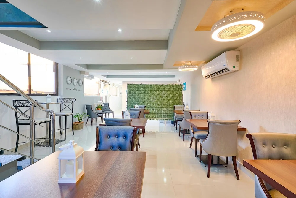 Malecon Premium Rooms & Hotel