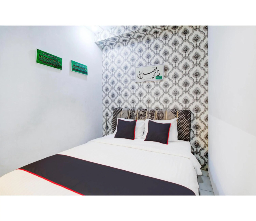 Hotel O Jalan Jenderal Sudirman Near Imam Bonjol Square Formerly Nelvi Guest House