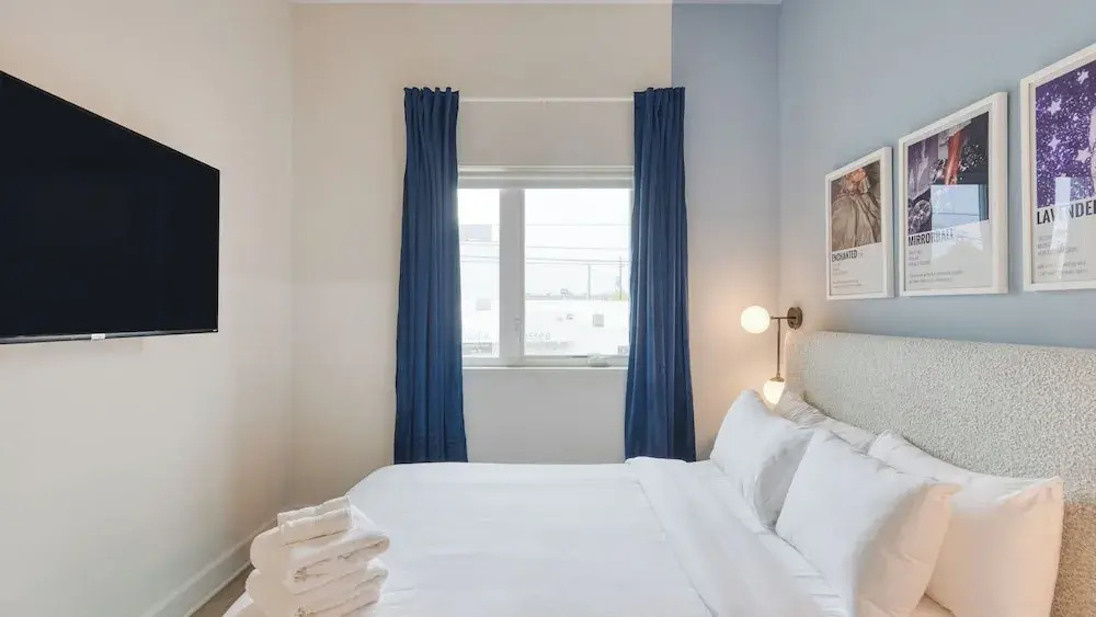 Sleeps 44 4 Themed Lofts w/ Skyline Balconies, Neon Backdrops & Glam Kitchensperfect for Nashville Group Stays The Swift Retreat by Avantstay