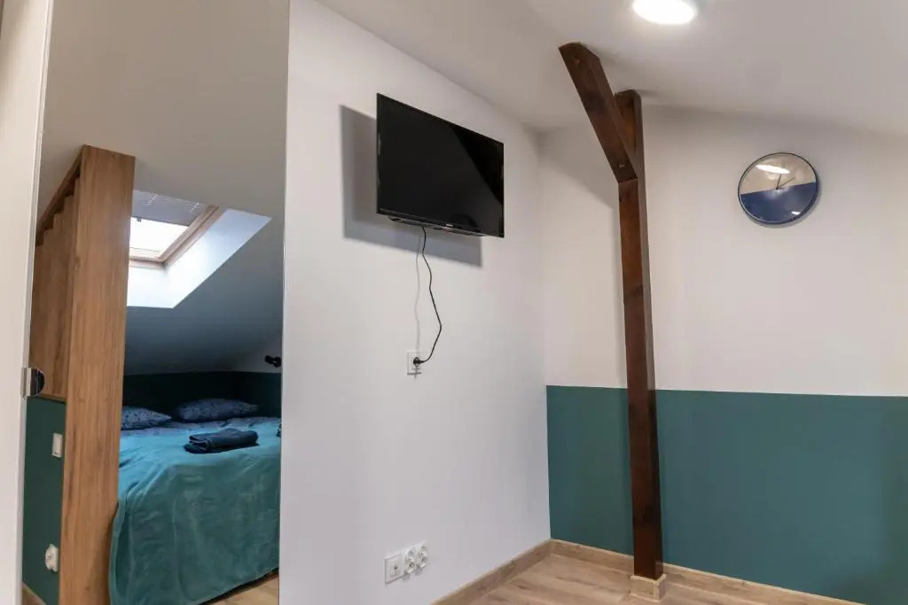 Uroczy, przytulny apartament poddasze
