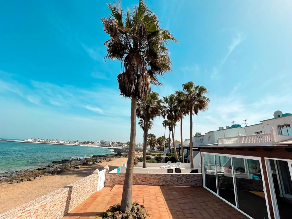 Beachfront Villa San Antonio with Private Heated Pool BBQ in the Heart of Corralejo by Amazzzing Travel