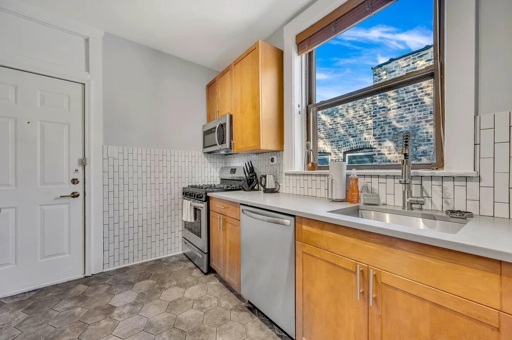 Stunning, Spacious, & Sun-soaked 2BR Uptown Condo by AllSet Turnover