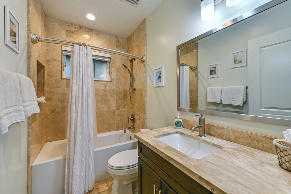 Stroll to Shore: Oceanside Condo w/ Hot Tub Access