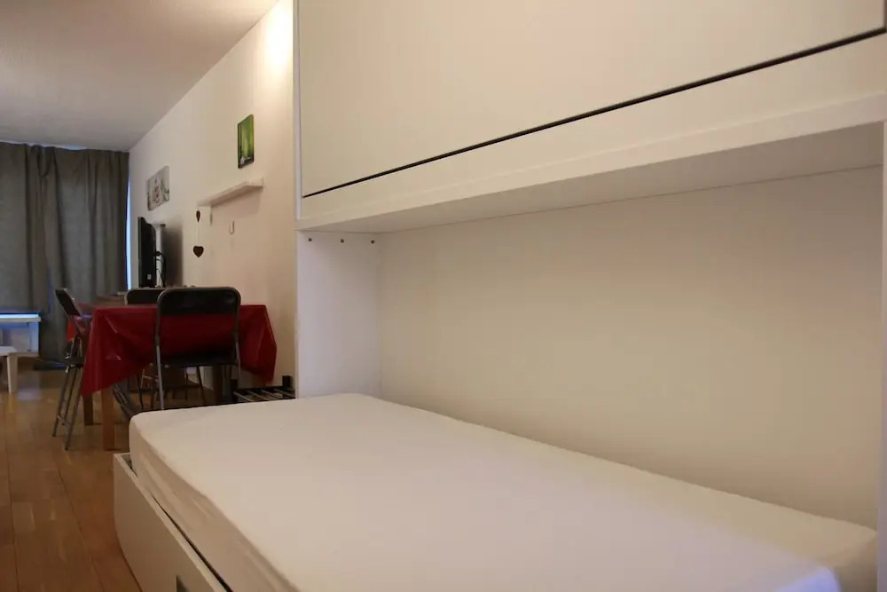 nice apartment with bedrrom and bunk beds in the entrance Apartment 1