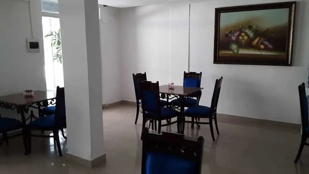 The Garden Hotel y Restaurant