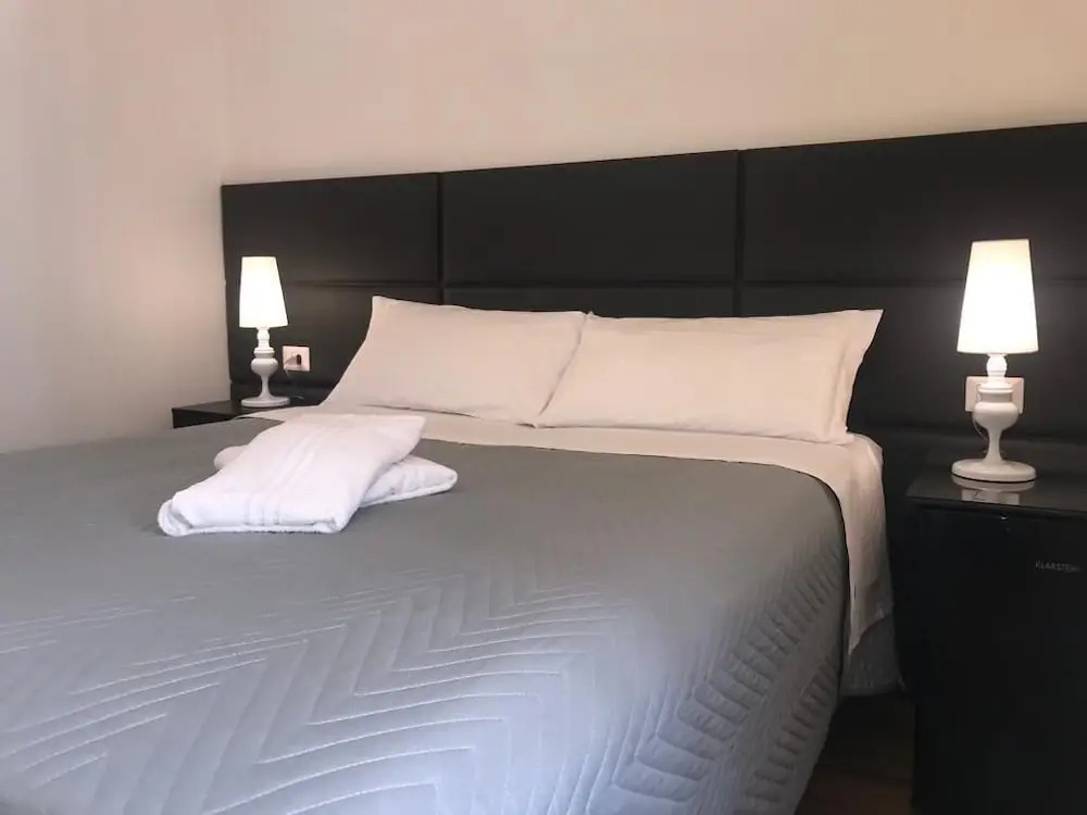 Motta Palace Apartments & Rooms