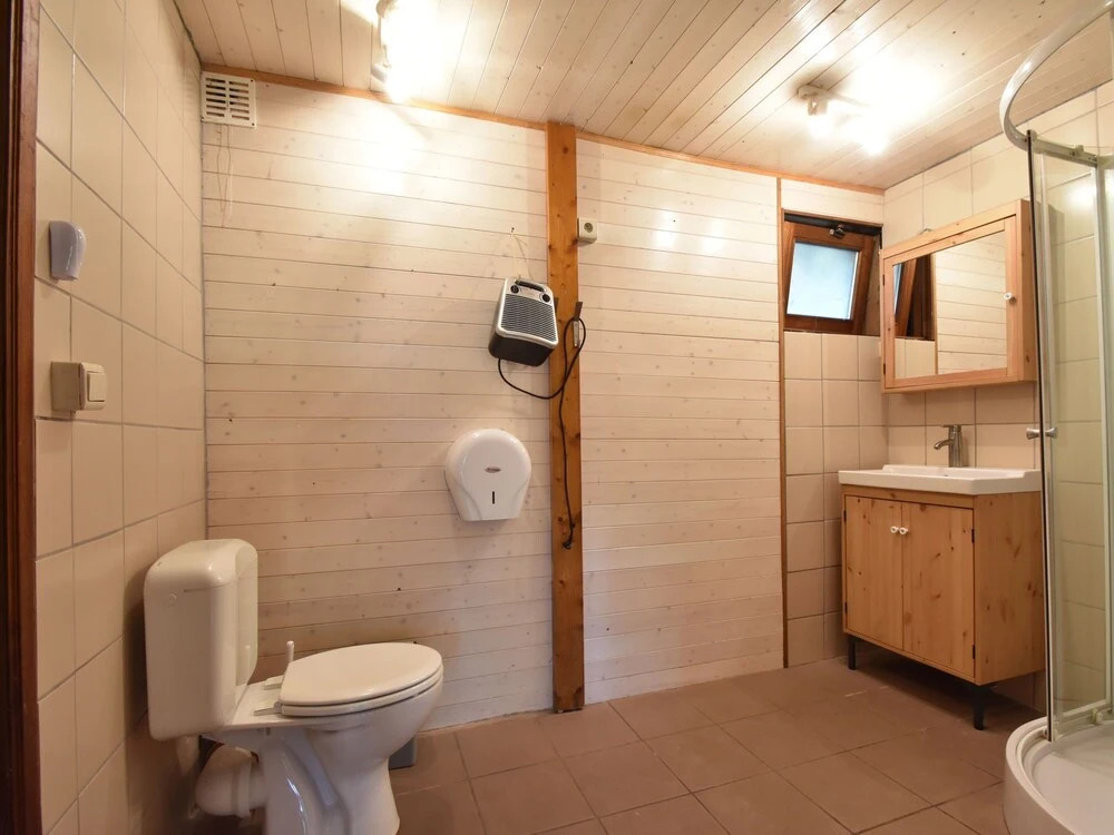 Nestled In A Green Scenery, This Chalet Along The River Is Perfect To Chill Out!