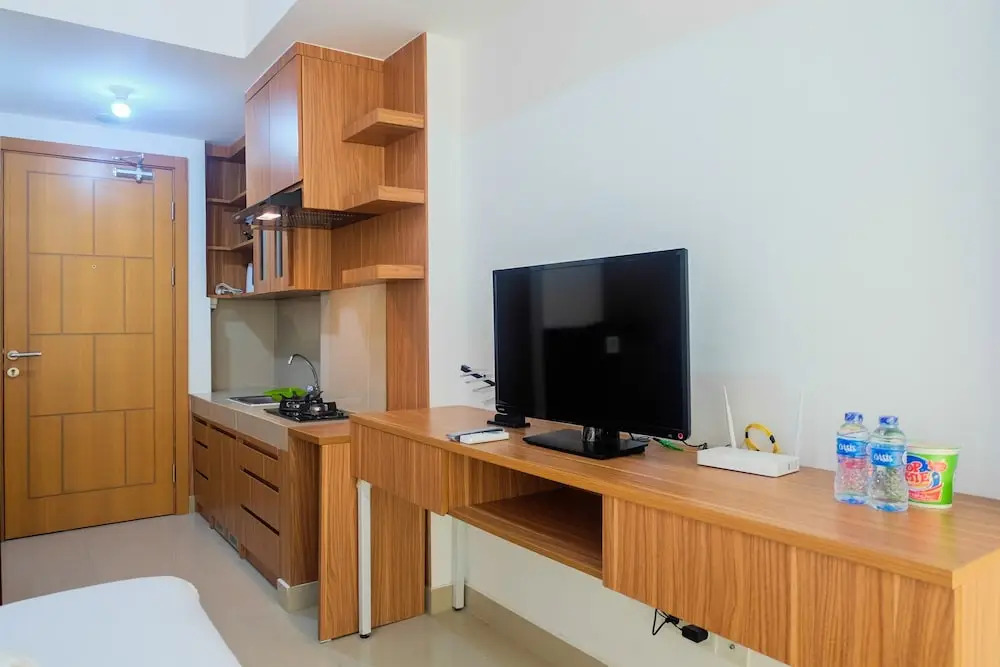 Brand New Compact Studio The Nest Puri Apartment By Travelio