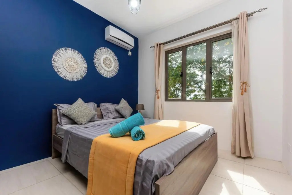 West Wood Holiday Apartment, C6 - Flic en Flac with pool at a quiet location, beautifully decorated and close to the beach