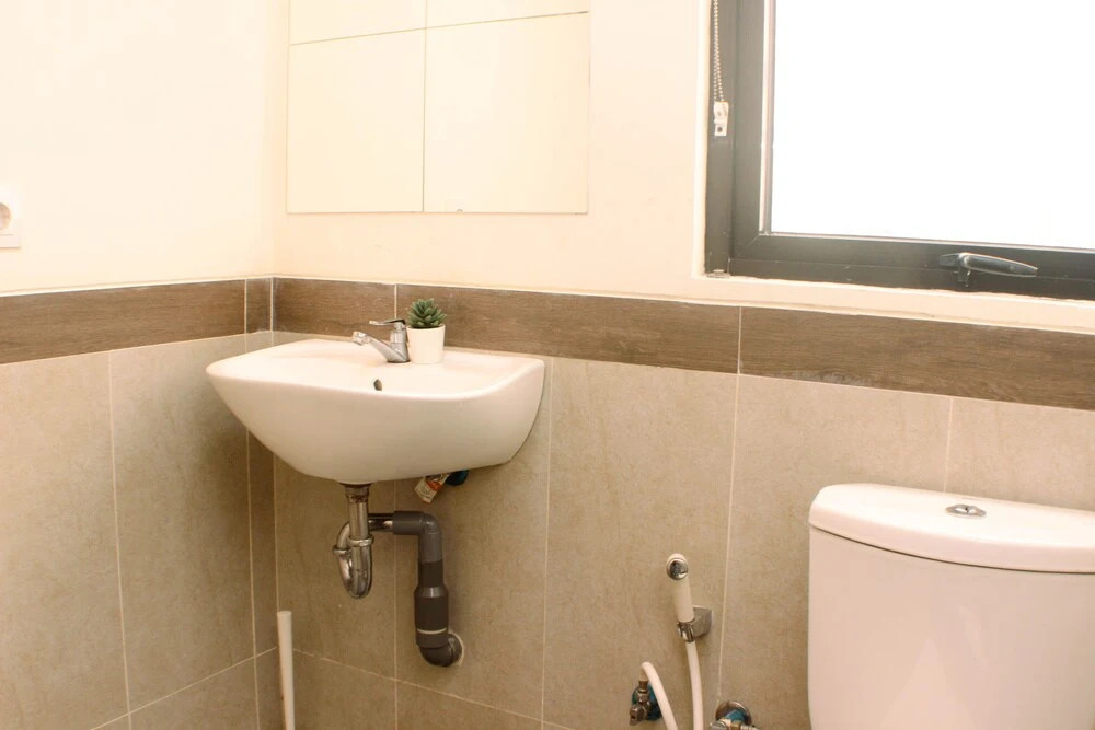 Comfort Stay 2BR at Meikarta Apartment By Travelio