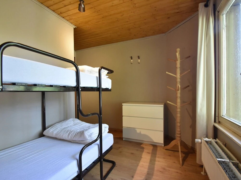 Nestled In A Green Scenery, This Chalet Along The River Is Perfect To Chill Out!