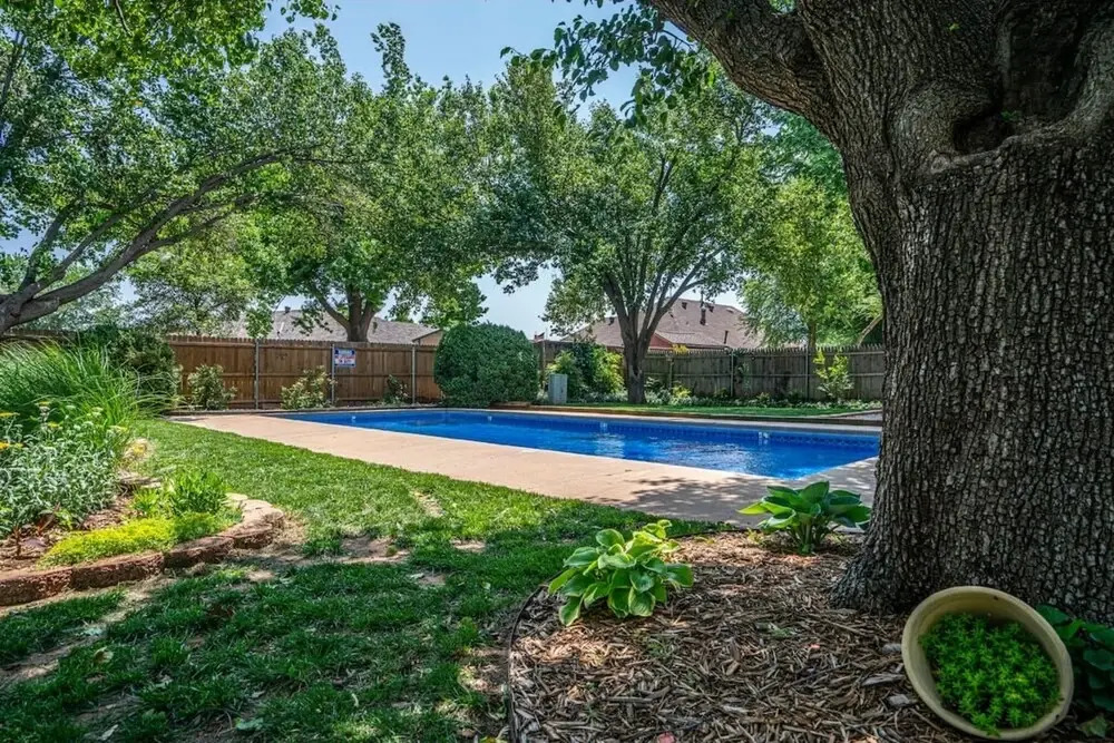 Spacious Retreat With Shaded Yard & Games 4 Bedroom Home by RedAwning