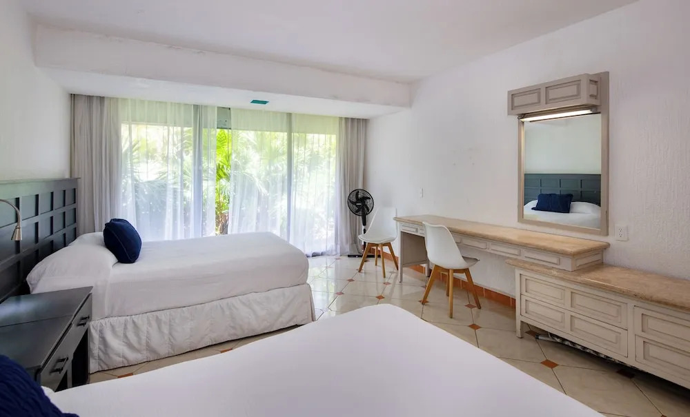 Cancun Jr Suite en resort vista al mar