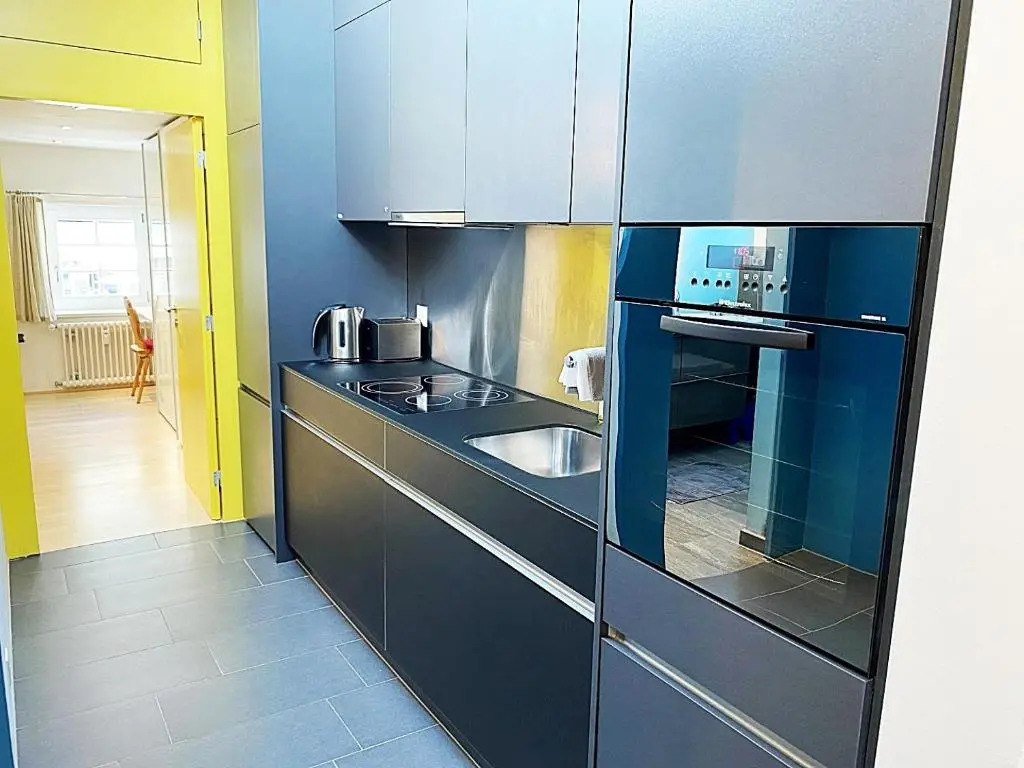 Dachwohnung im Alpenstil, 60m2 für 2P, mit Garage BM186