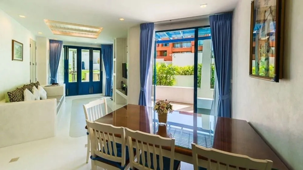 The Che Pool Access Beachfront Condo by Away
