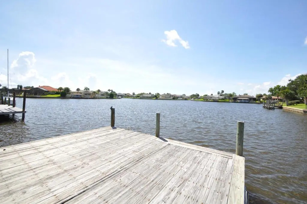Sunset Bay Beautiful Pool Home - Bring Your Boat or Jet Ski - Canal with Dock- Sleeps 10 - 4 BD