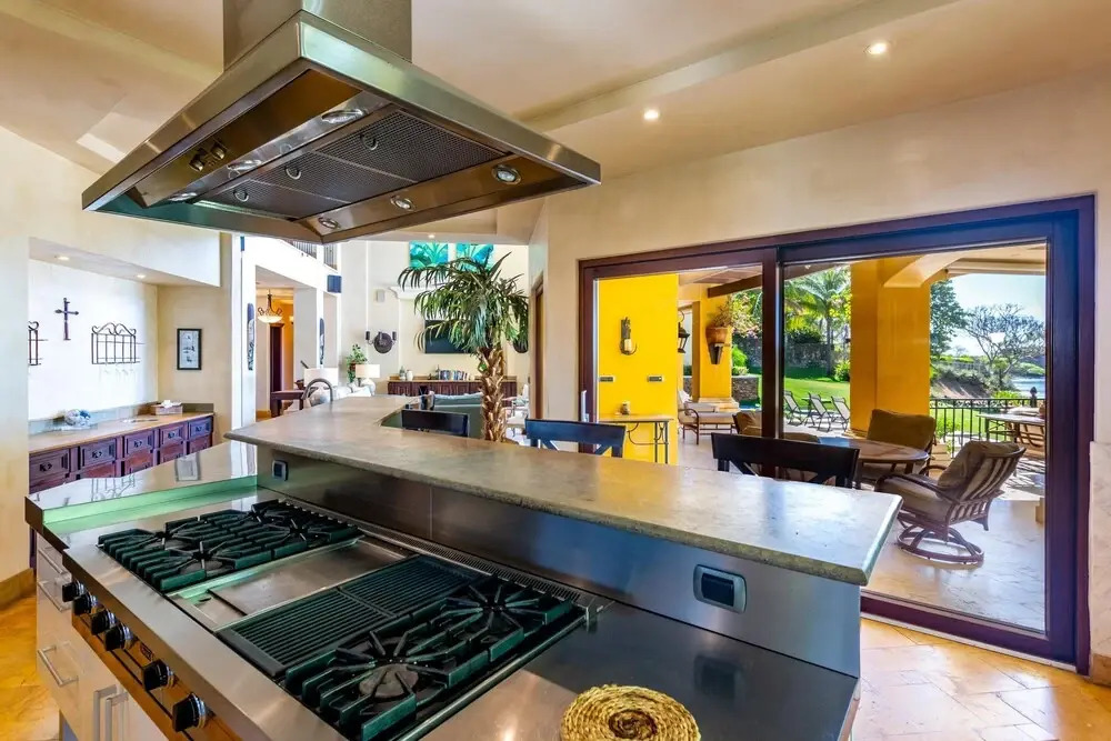 Elegant Mediterranean-Style Mansion with Beachfront Views and Private Infinity Pool