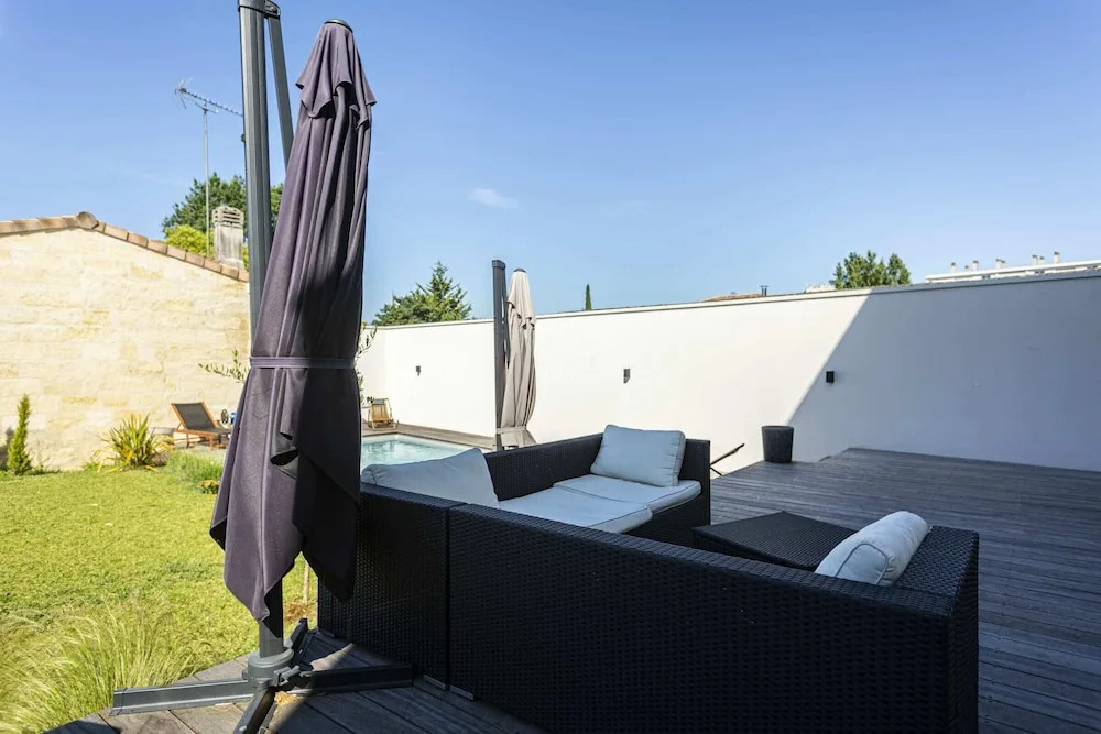 Stunning Home with Private Pool and Patio by GuestReady