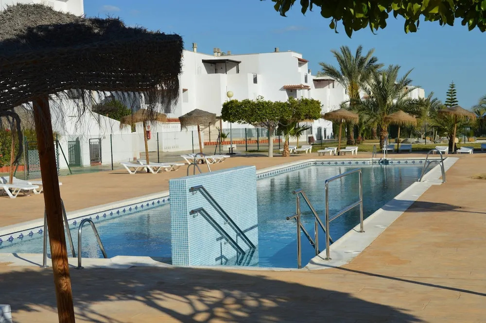 Ground floor apt facing the nudist beach, with private patio & East orientation