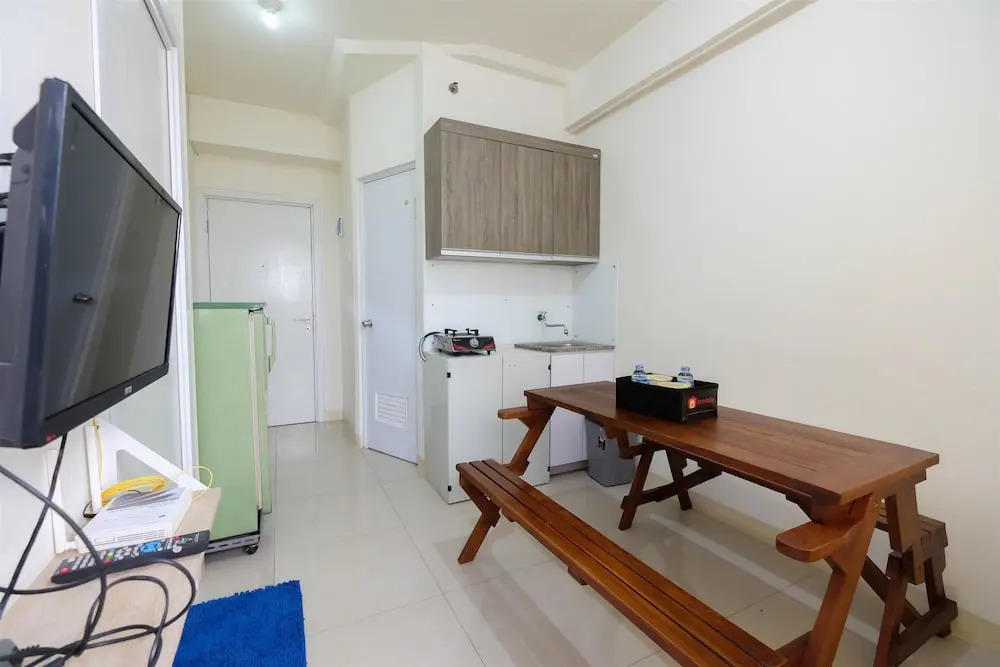 2BR Artistic Room Green Pramuka Apartment closed to Mall By Travelio