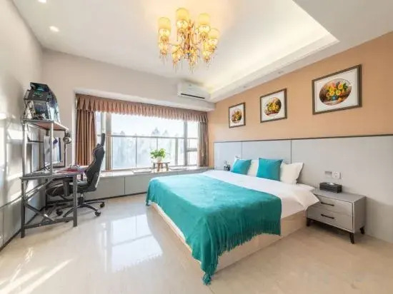 Yuexi Boutique Hotel (Xinyang East Railway Station Evergrande Plaza)
