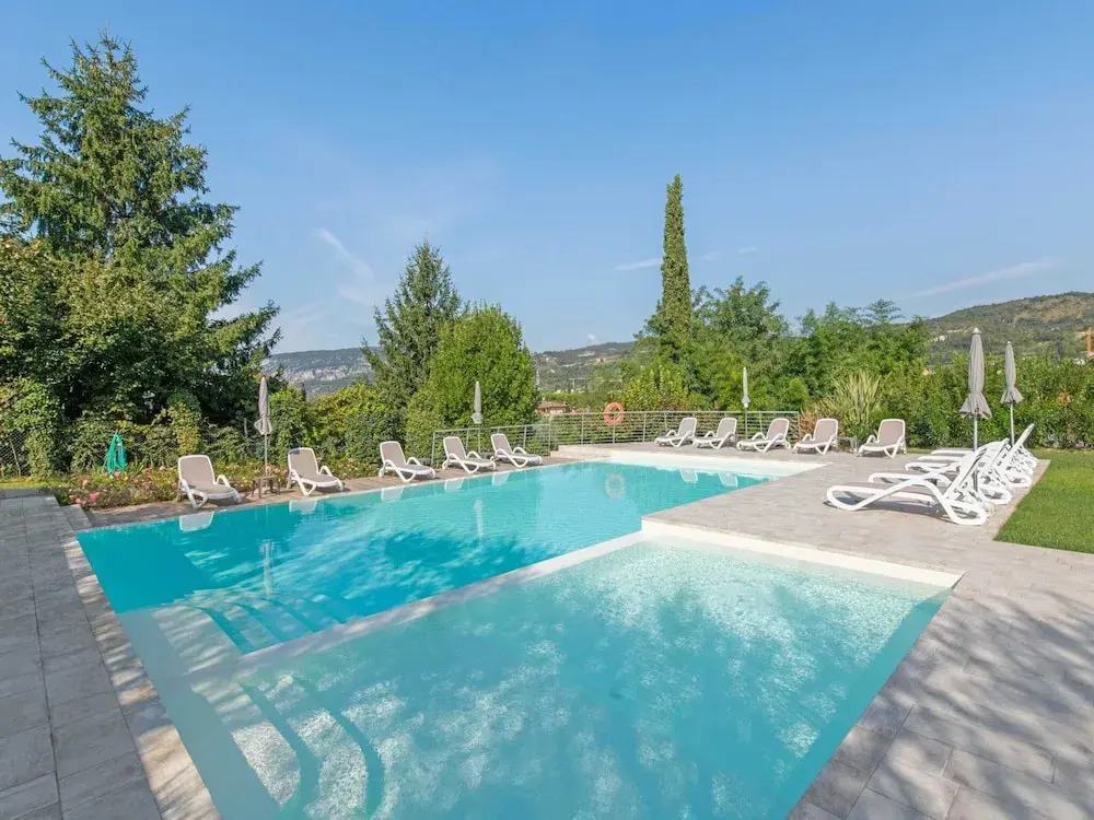 Belvilla by OYO Comfortable Apartment With Pool