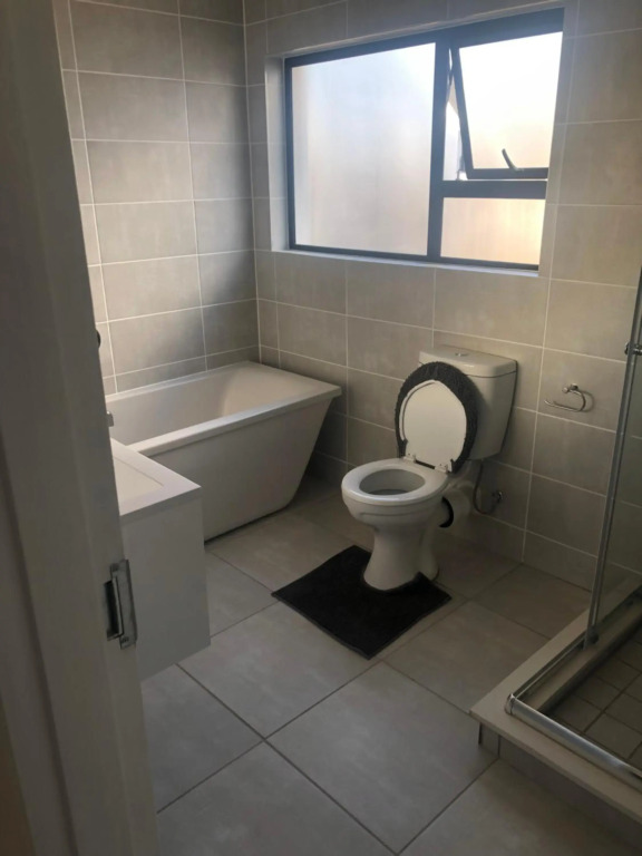 A Coastal/island experience at a Large 2 bed apartment at a Crystal Lagoon Estate