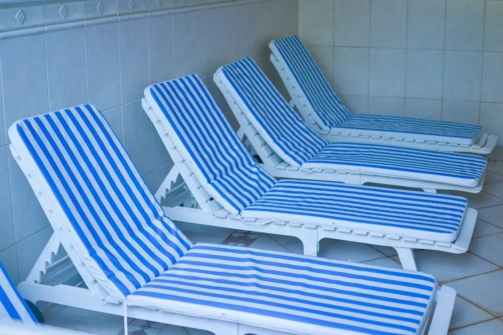 150m da praia com piscina aquecida e sauna