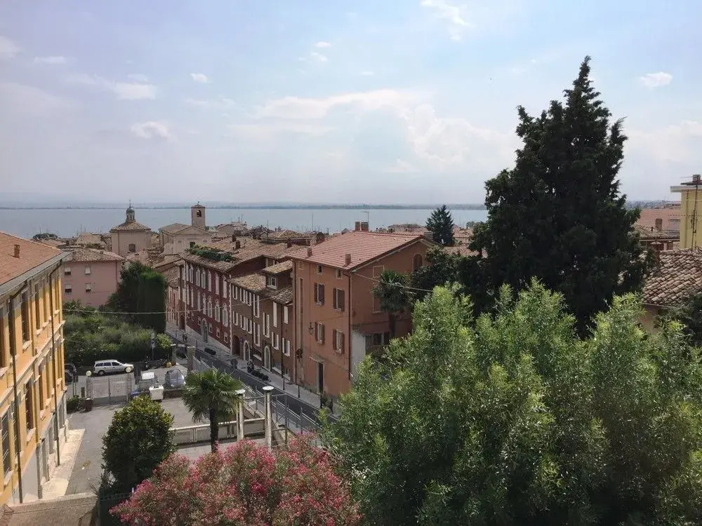 Smiling in Desenzano Lake View DesenzanoLoft Official Partner Homes & Villas by Marriott Bonvoy
