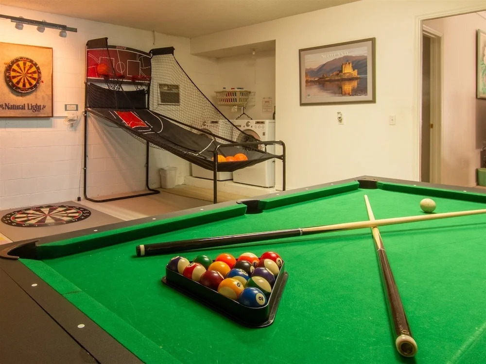 3 Bedroom Home With Private Screened Pool With Rock Waterfall Feature and Gameroom by Florida Dream Homes