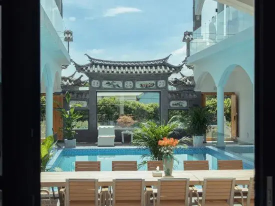 Dali Qihai Tingfeng Inn (Zhangjia Garden Branch)
