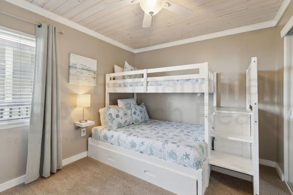 Newly Remodeled Oceanfront Condo with Salt Water Pool and Private Walkway to Beach by RedAwning