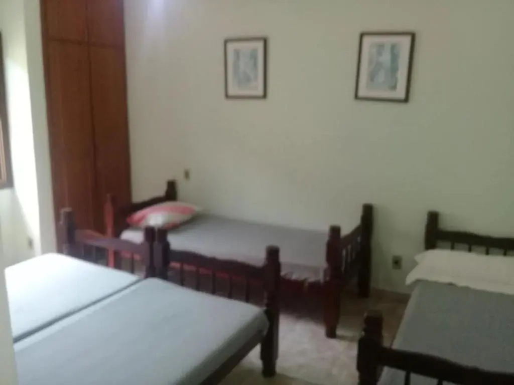 Casa com ar condicionado a 50 metros da Praia da Riviera no Jardim São Lourenço - Casa com Wi-Fi
