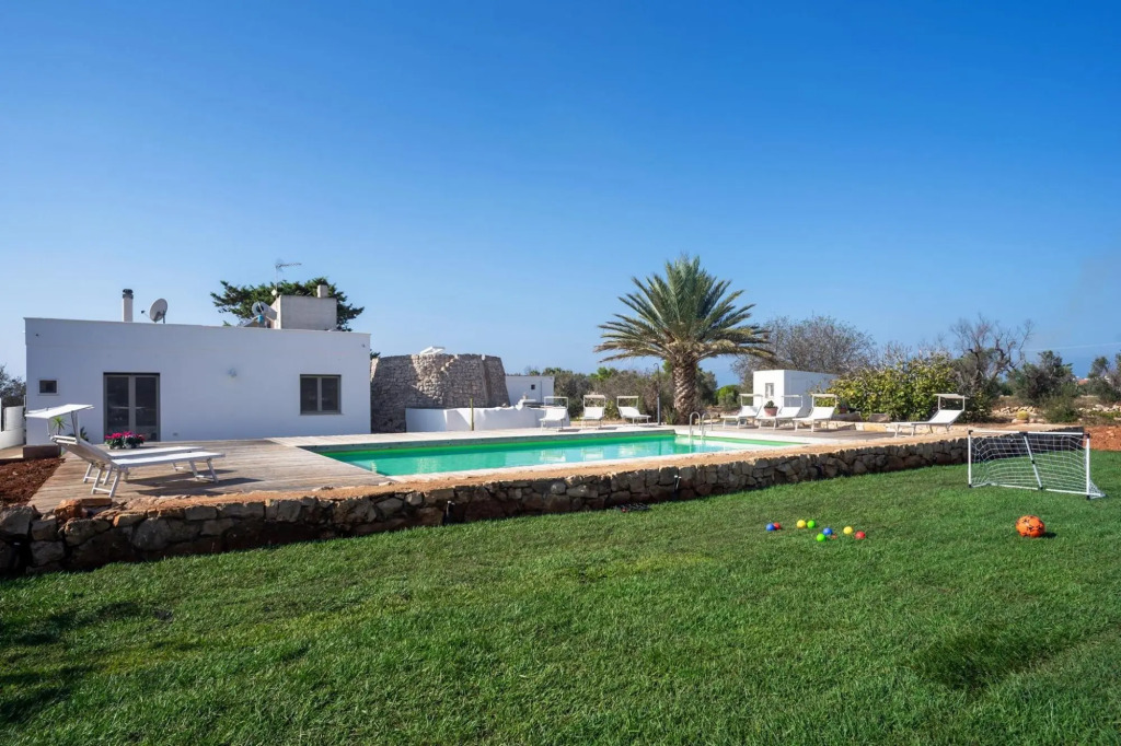 Typical property with swimming pool completely surrounded by secular olive trees and Mediterrean maq-VILLATRULLO MELOGRANO