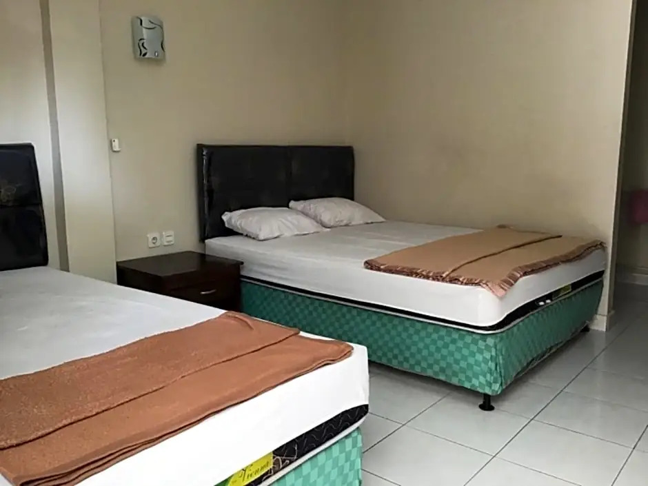 OYO 90520 Kuta Family Guest House