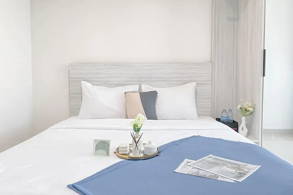 Simple White Designed Studio At Lrt City Bekasi Apartment
