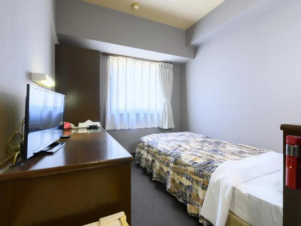 Tabist IWATA Station Hotel