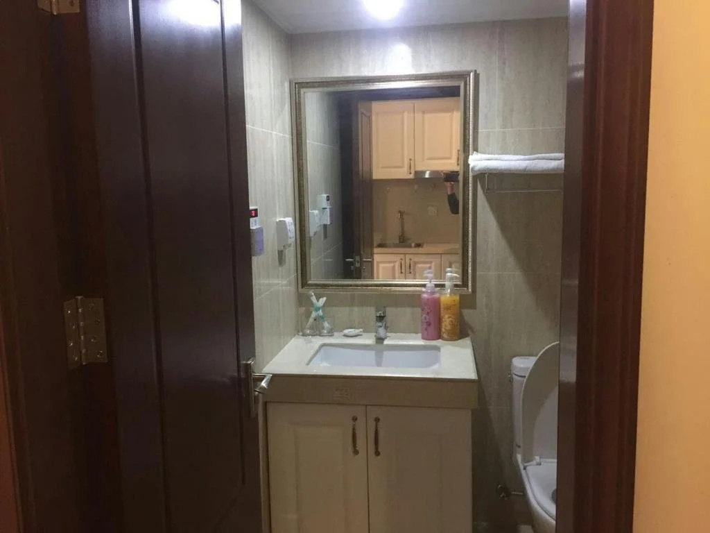 Shenyang Yiju ApartHotel