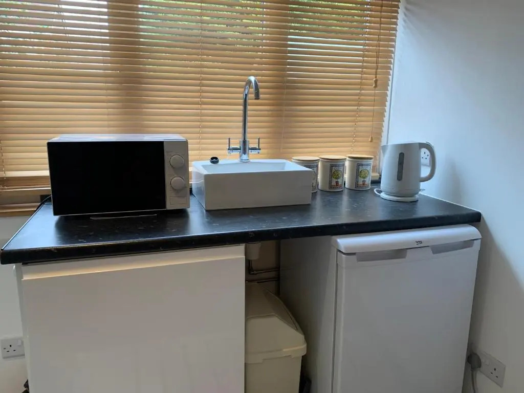 One bedroom self contained annex with own bathroom, sitting room and kitchenette